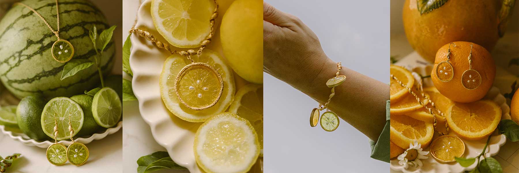Gold jewelry pieces featuring realistic lemon, lime, and orange slice designs are displayed with matching citrus fruits in various arrangements.