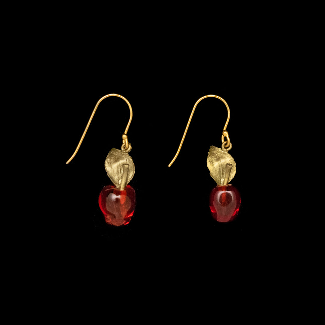 Image of the Michael Michaud Delicious Apple Earrings - Wire on a black background