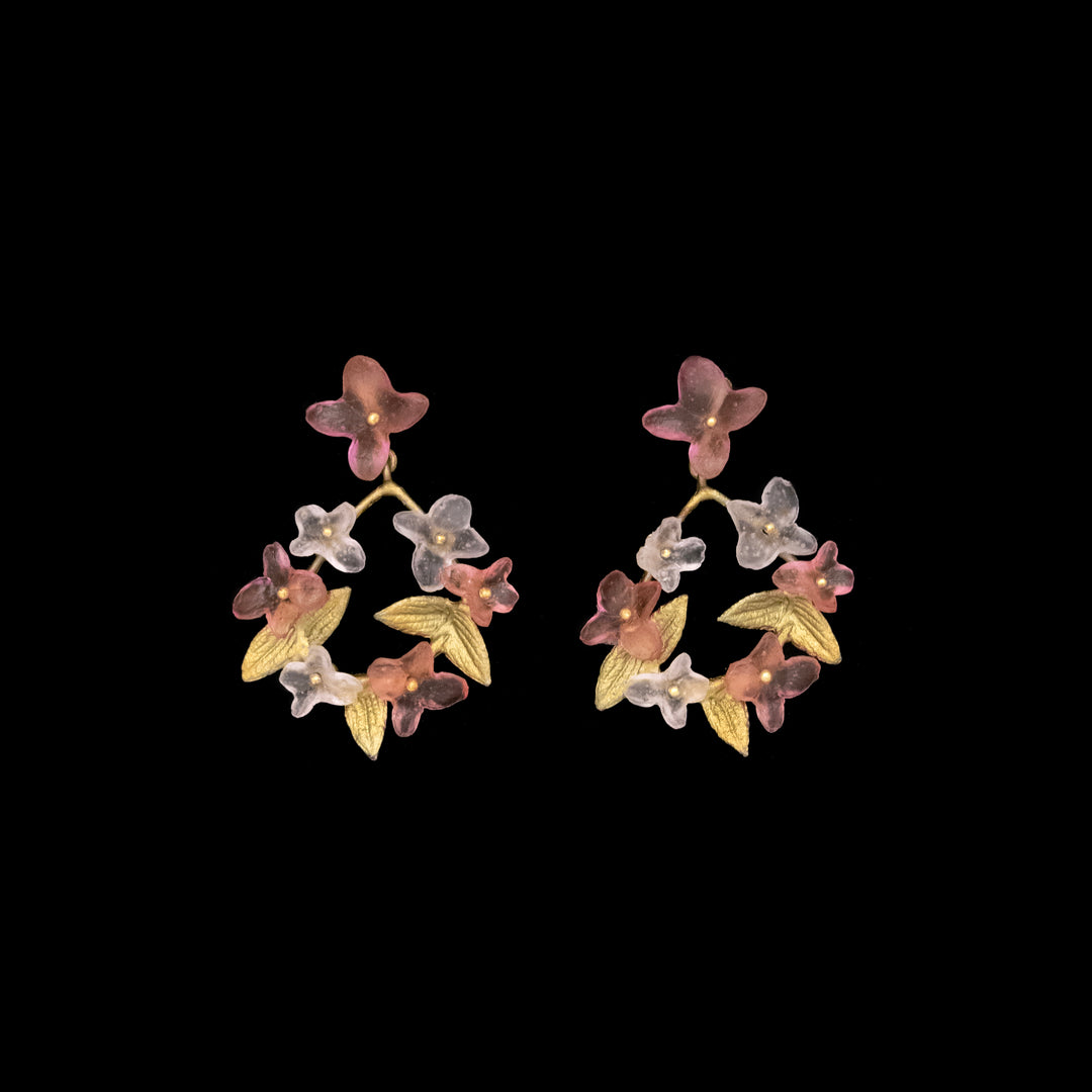 Image of the Michael Michaud Pink Hydrangea Earrings - Hoop Post on a black background