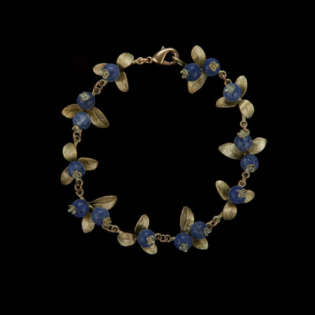 Image of the Michael Michaud Blueberry Bracelet on a black background