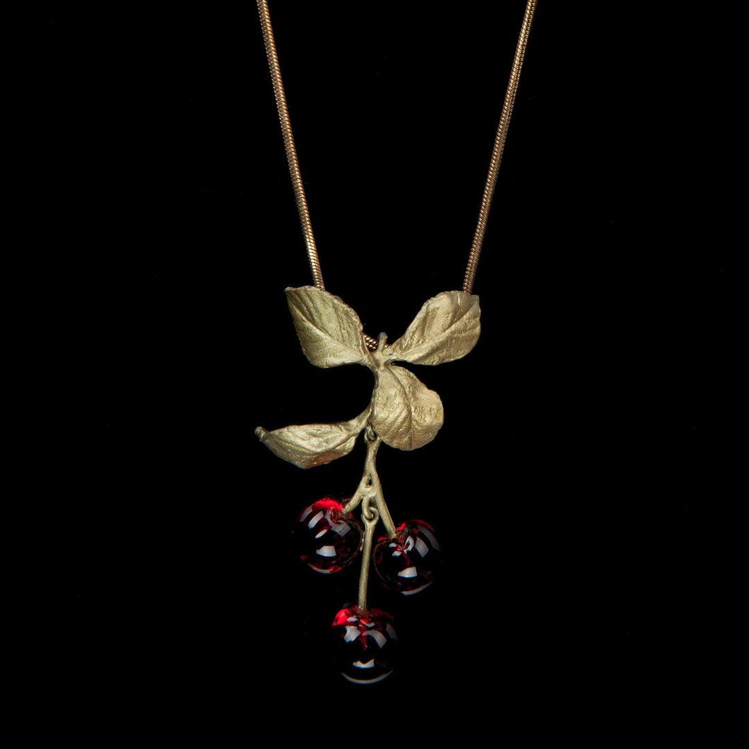Image of the Michael Michaud Morello Cherry Pendant on a black background