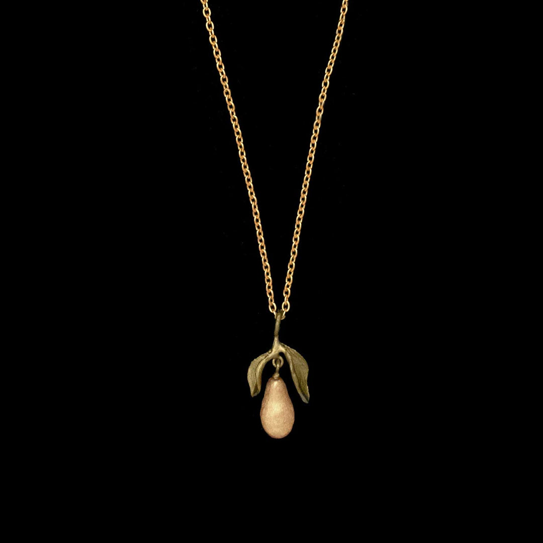 Image of the Michael Michaud Golden Pear Pendant on a black background