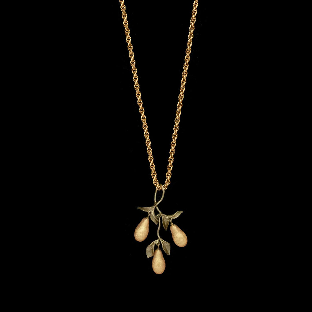 Image of the Michael Michaud Golden Pear Pendant - Long on a black background