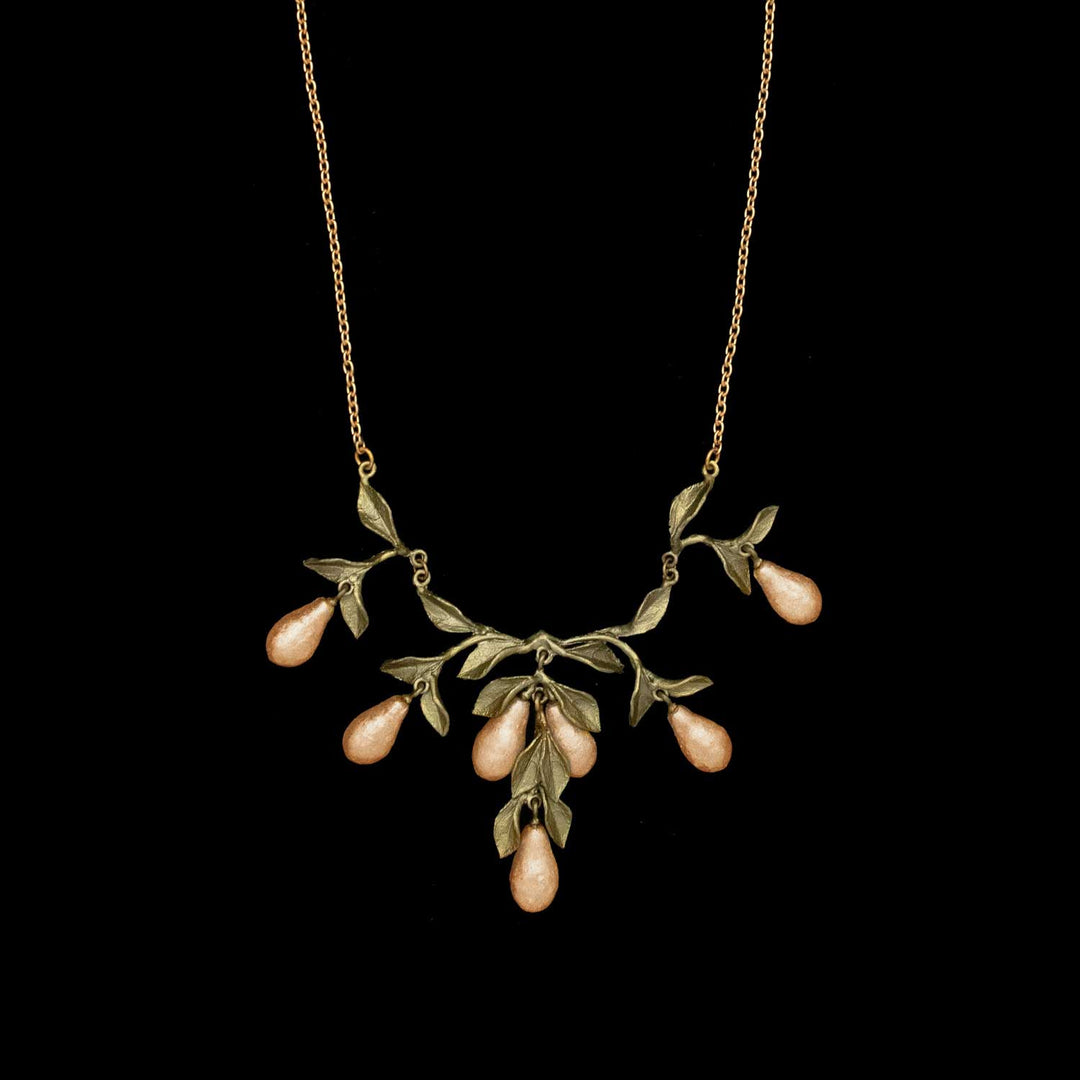 Image of the Michael Michaud Golden Pear Necklace on a black background