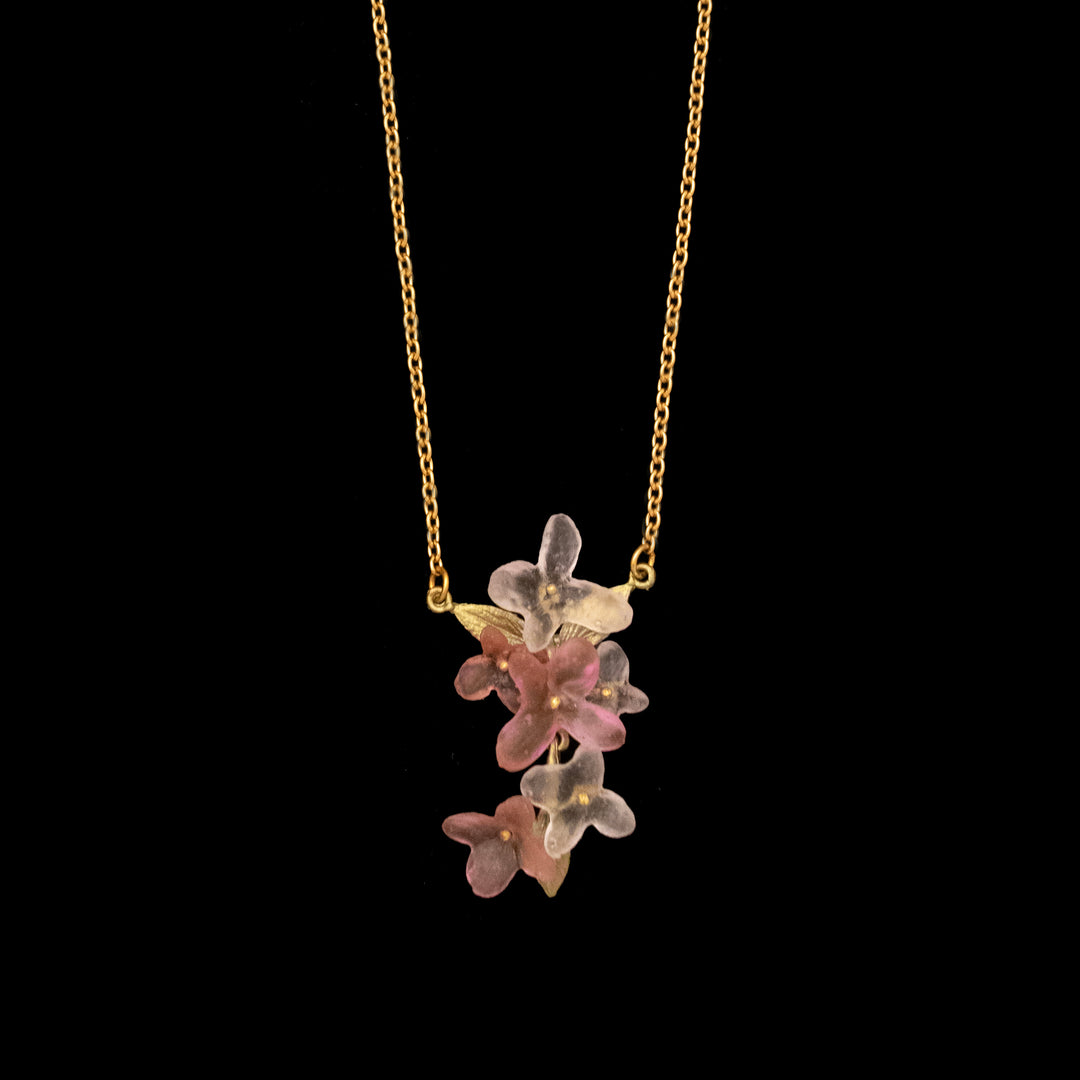 Image of the Michael Michaud Pink Hydrangea Pendant on a black background