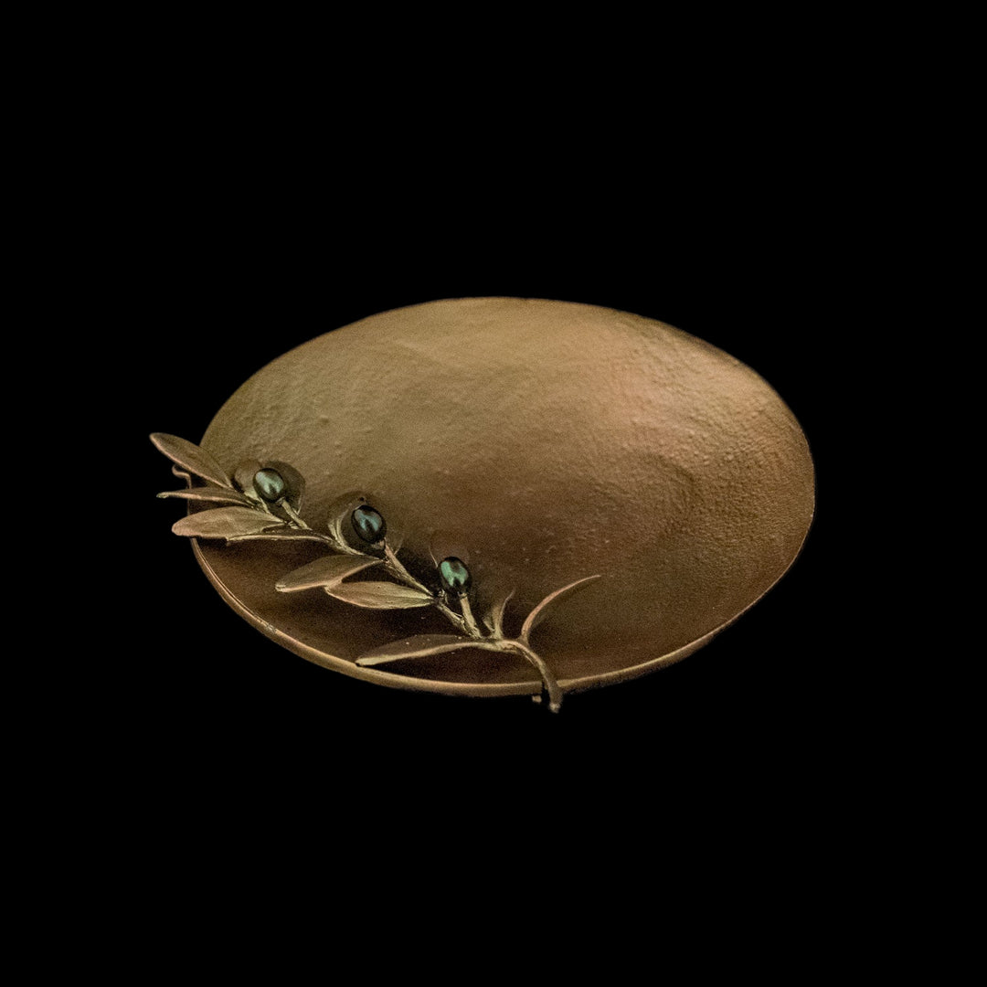 Image of the Michael Michaud Olive Dish on a black background