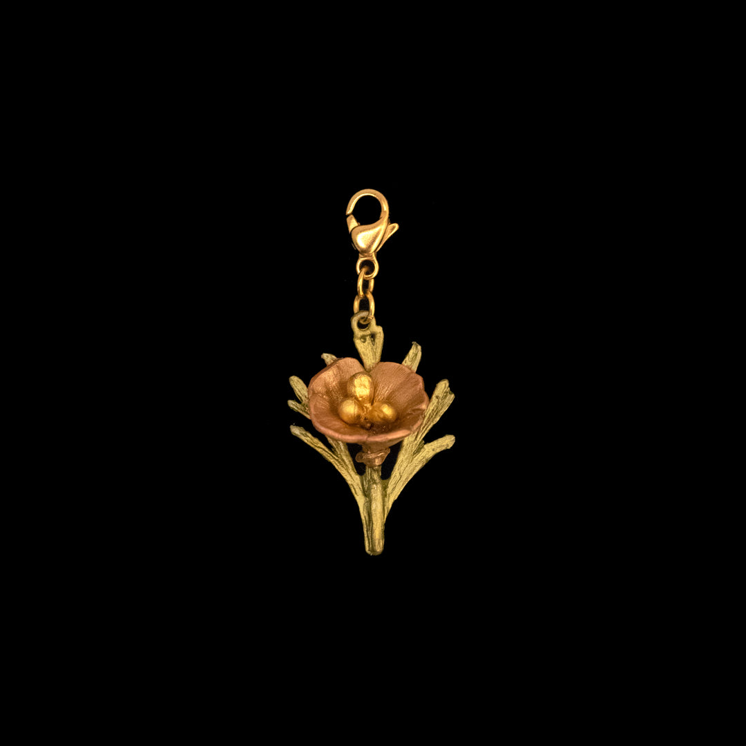 Image of the Michael Michaud California Poppy Charm on a black background