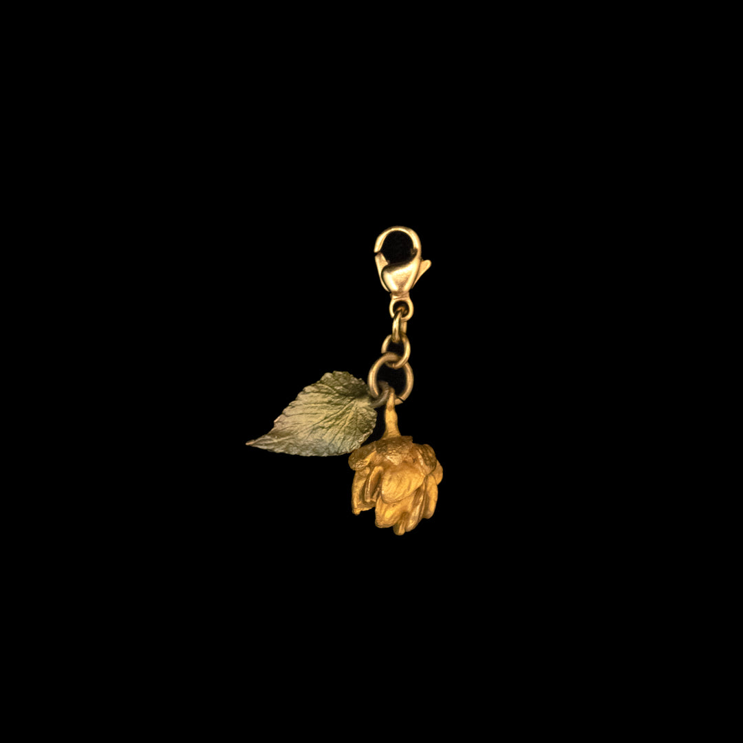 Image of the Michael Michaud Hops Charm on a black background