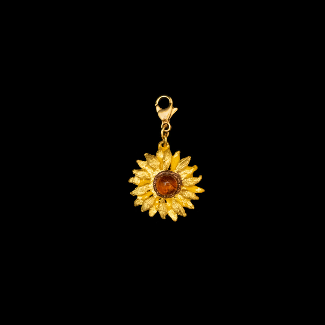 Image of the Michael Michaud Van Gogh Sunflower Charm on a black background