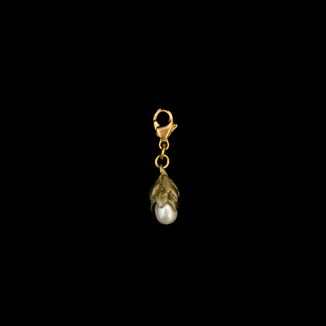 Image of the Michael Michaud Pearl Drop Charm on a black background