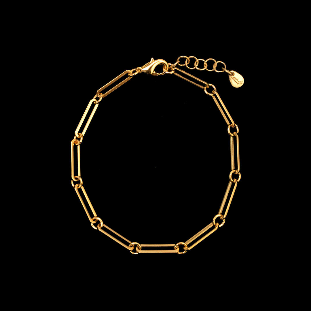 A gold-colored bracelet with a chain link design, featuring a clasp for closure.