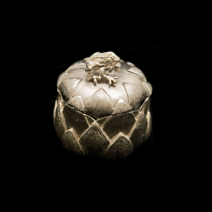 Image of the Michael Michaud Lotus Frog Box on a black background