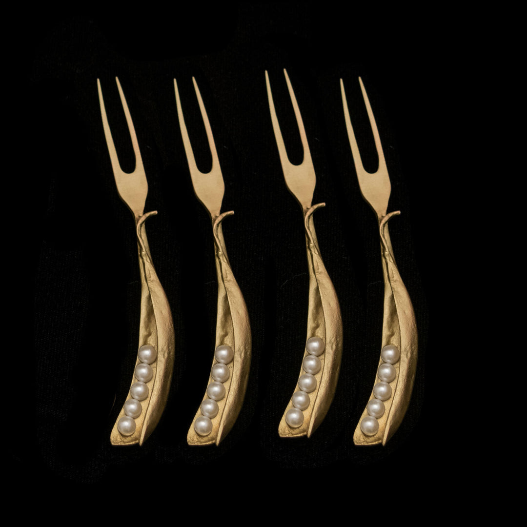 Image of the Michael Michaud Pea Pod 4 Piece Cocktail Fork Set on a black background