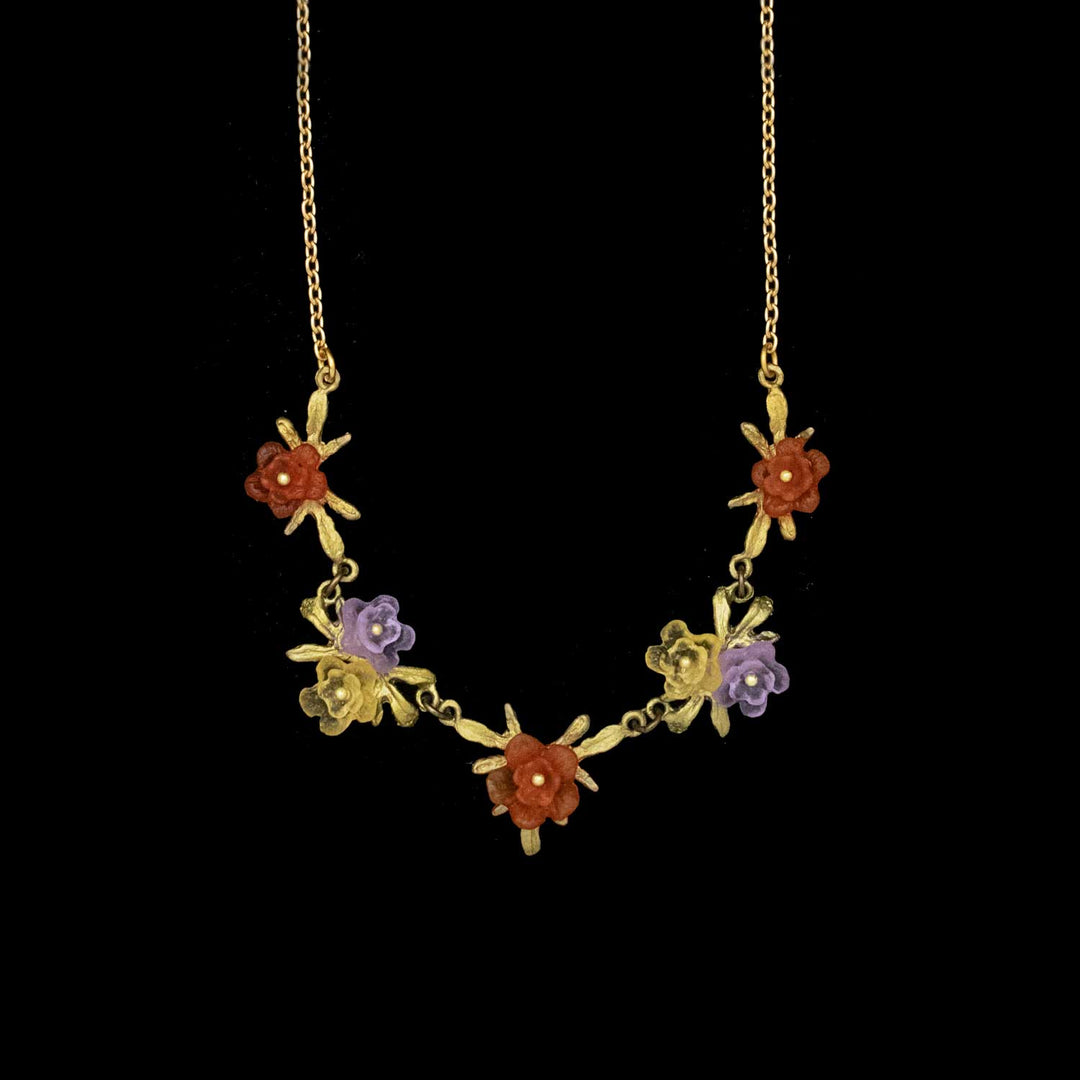 Image of the Michael Michaud Mums Necklace on a black background
