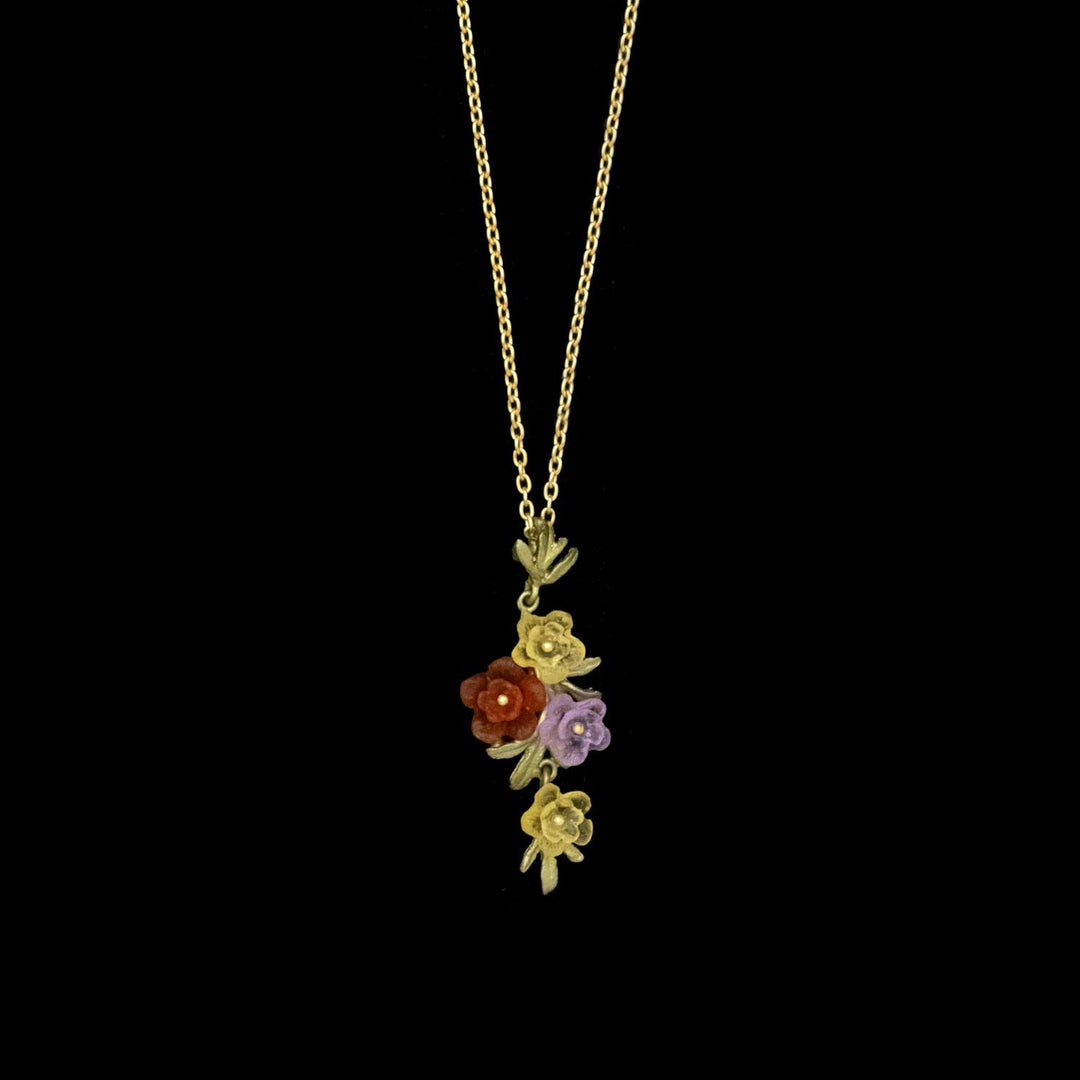 Image of the Michael Michaud Mums Pendant on a black background