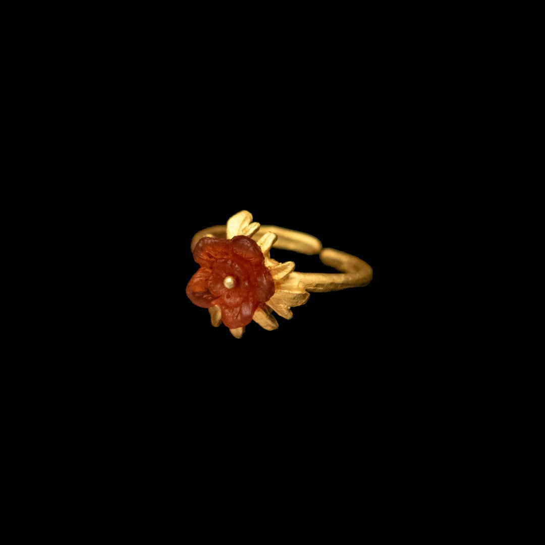 Image of the Michael Michaud Mums Ring - Scarlet on a black background