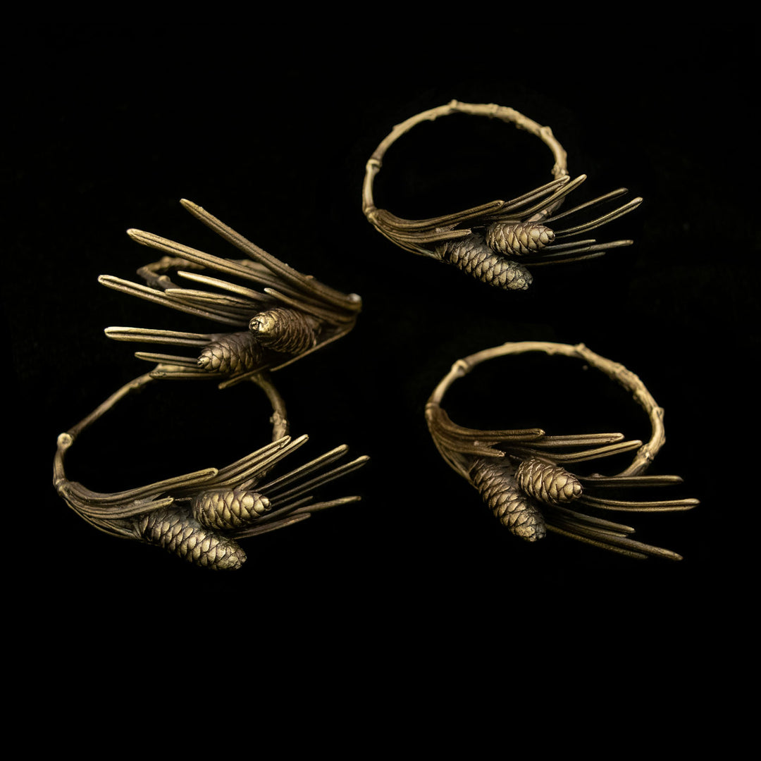 Image of the Michael Michaud Pine Napkin Ring Sets on a black background