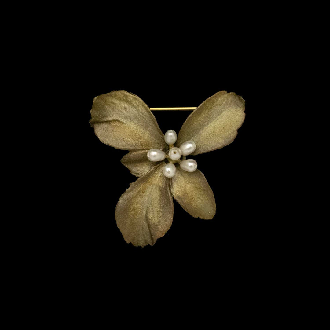 Image of the Michael Michaud Pachysandra Brooch on a black background