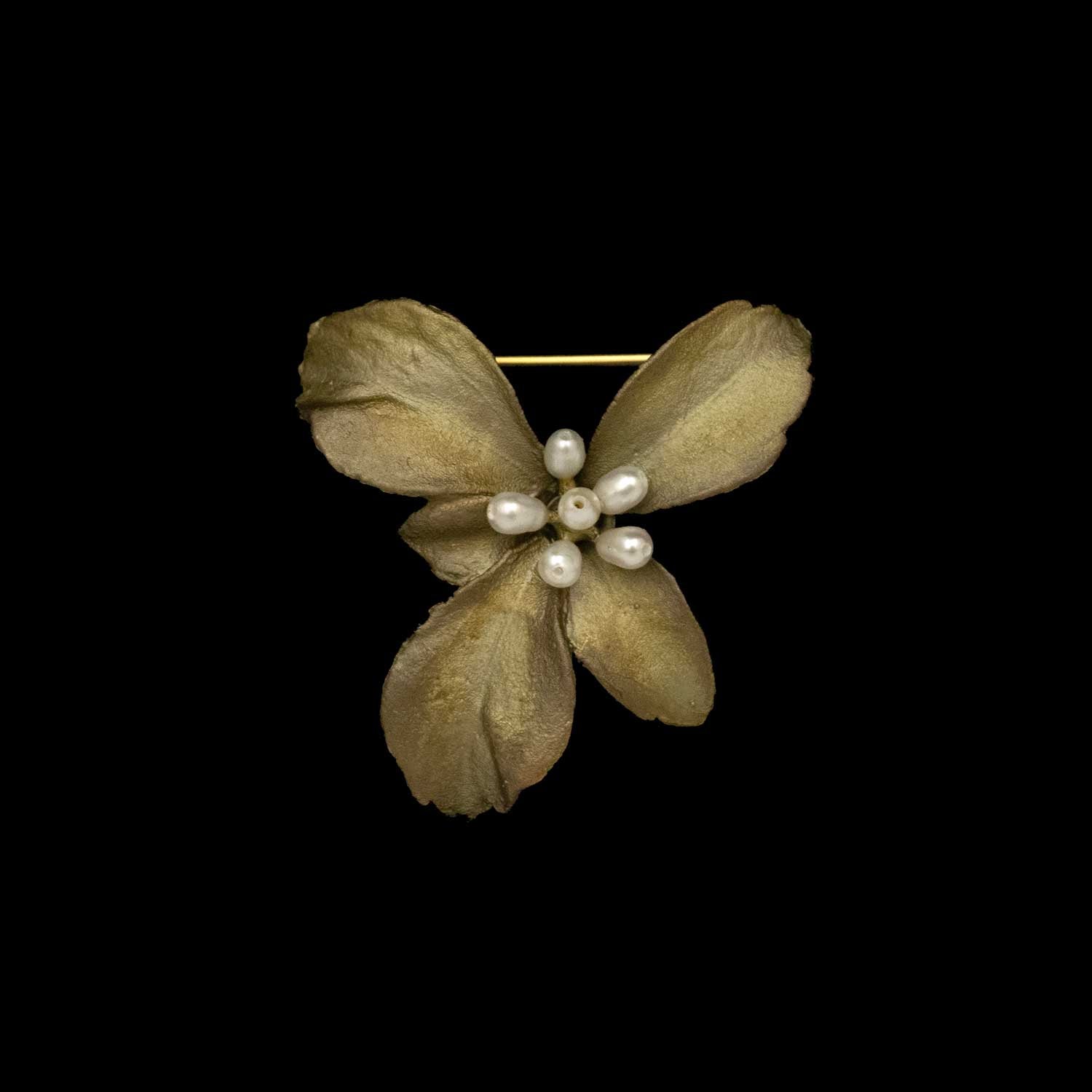 Image of the Michael Michaud Pachysandra Brooch on a black background