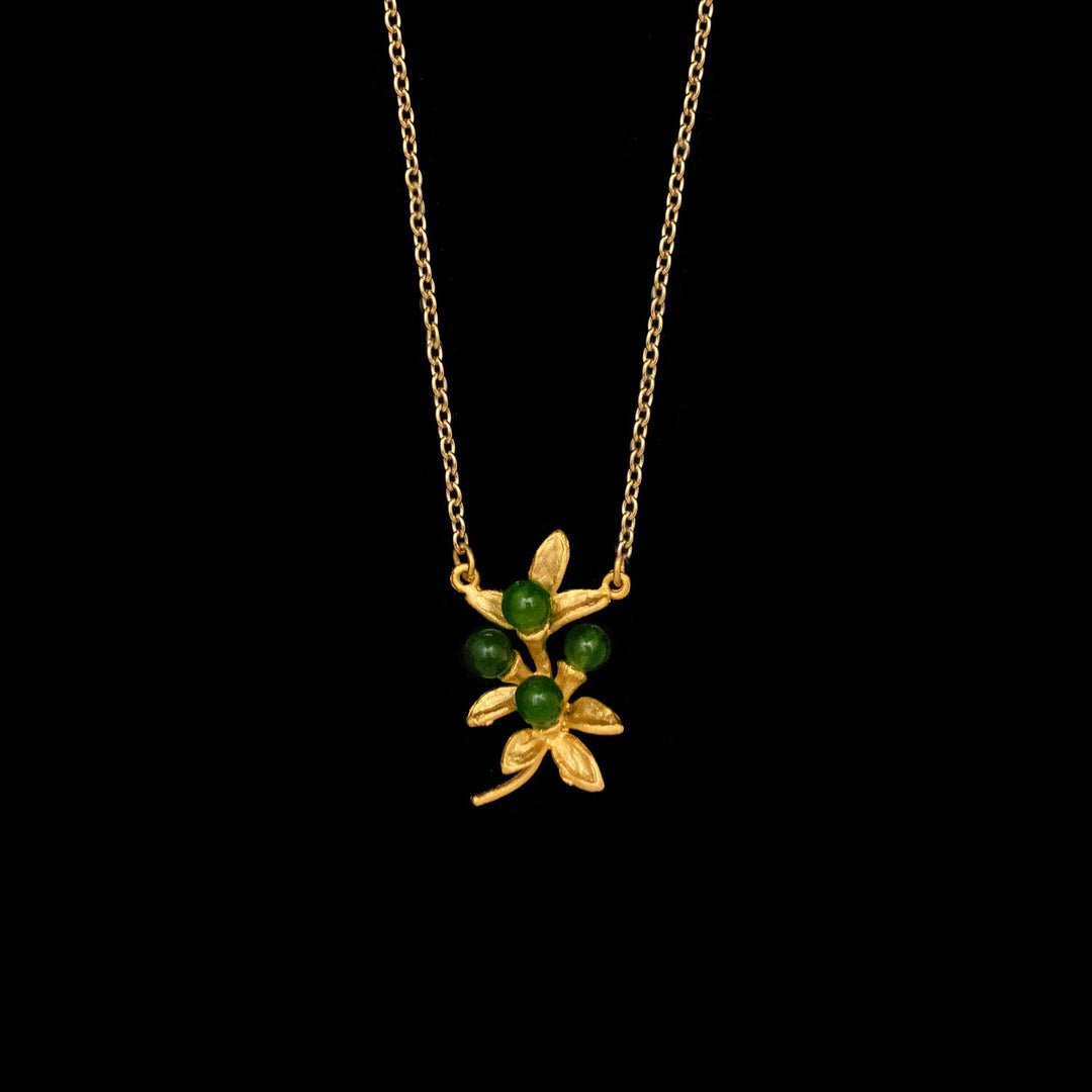 Image of the Michael Michaud Pepper Pendant on a black background