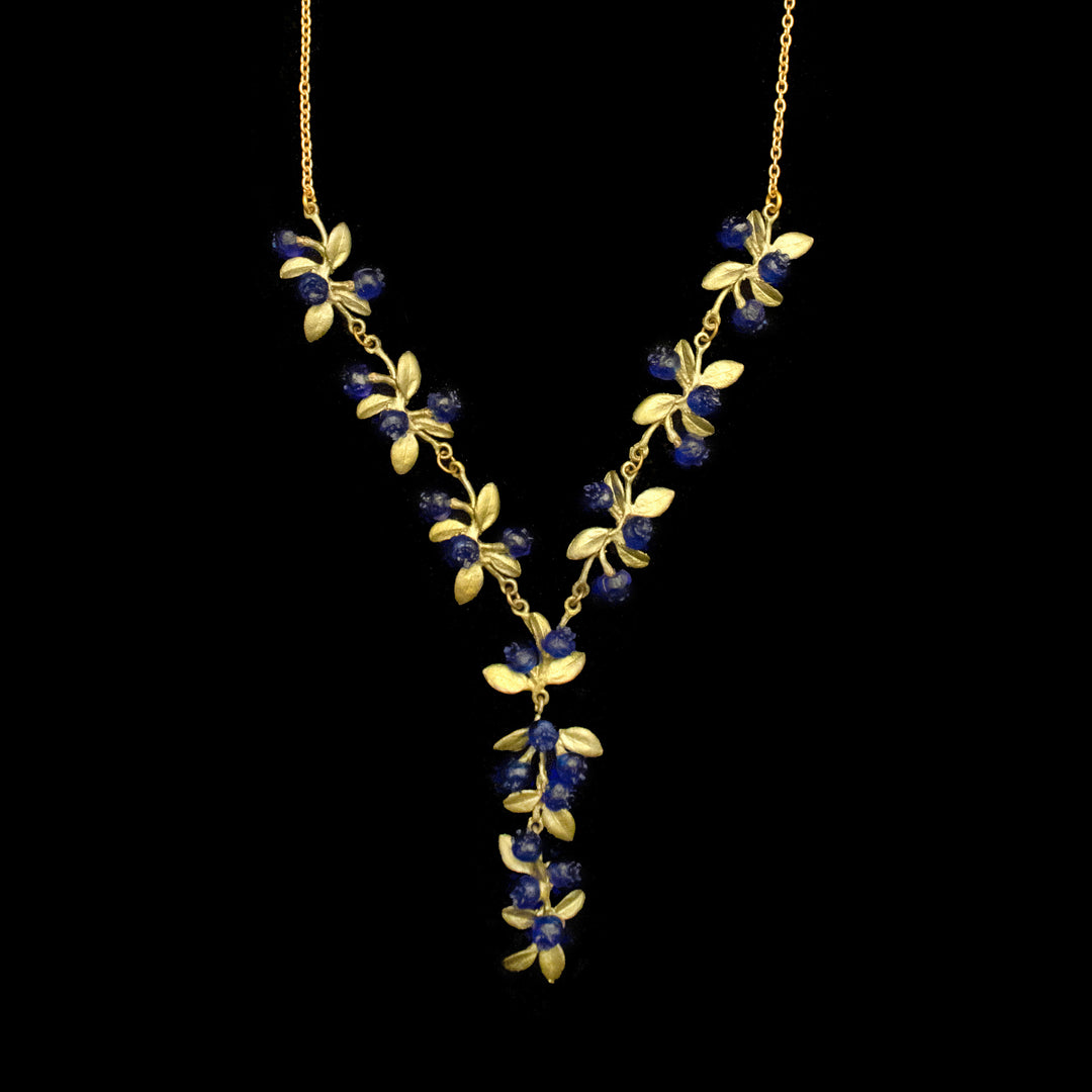 Image of the Michael Michaud Petite Blueberry Necklace - Drop on a black background