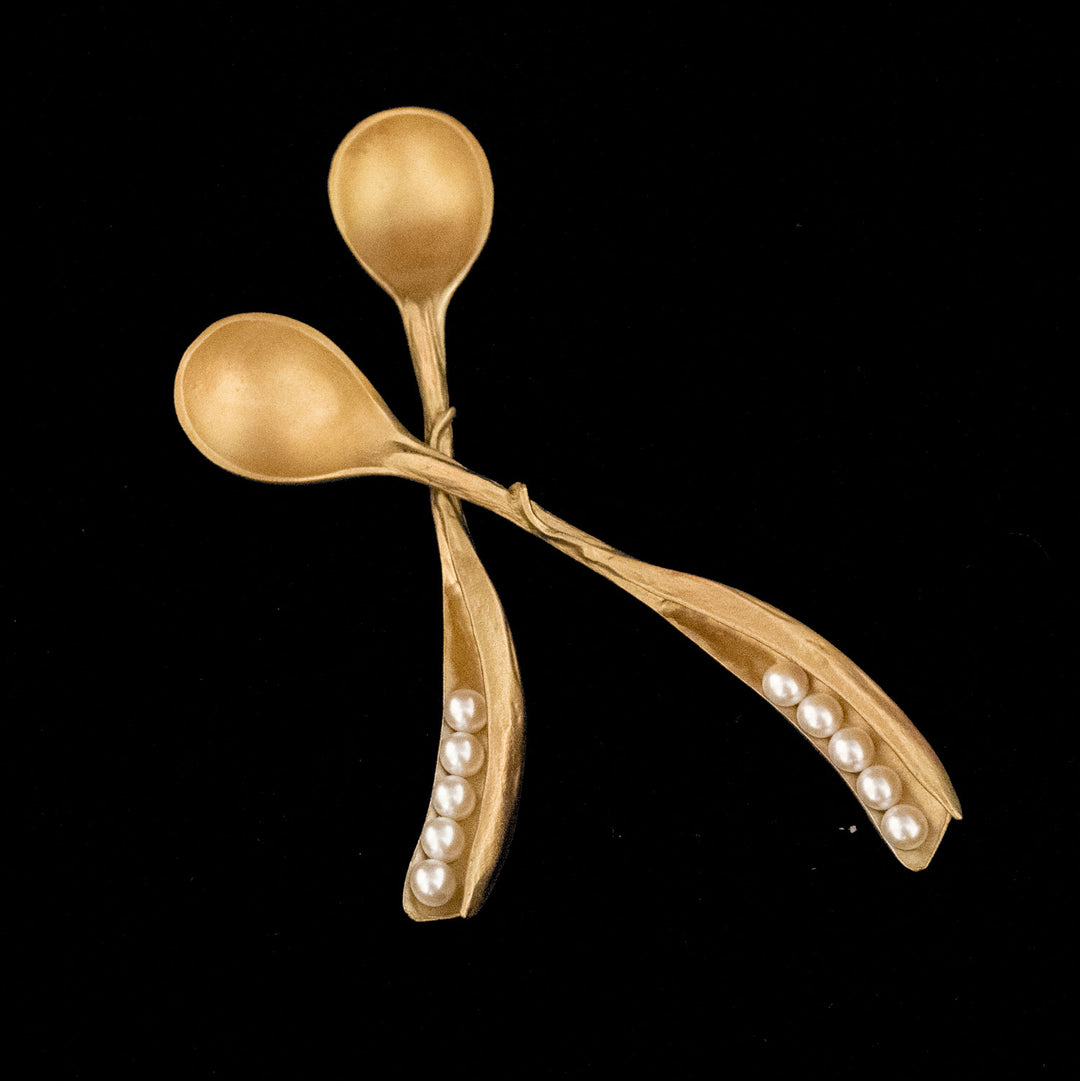 Image of the Michael Michaud Pea Pod Spoons - Set of 2 on a black background