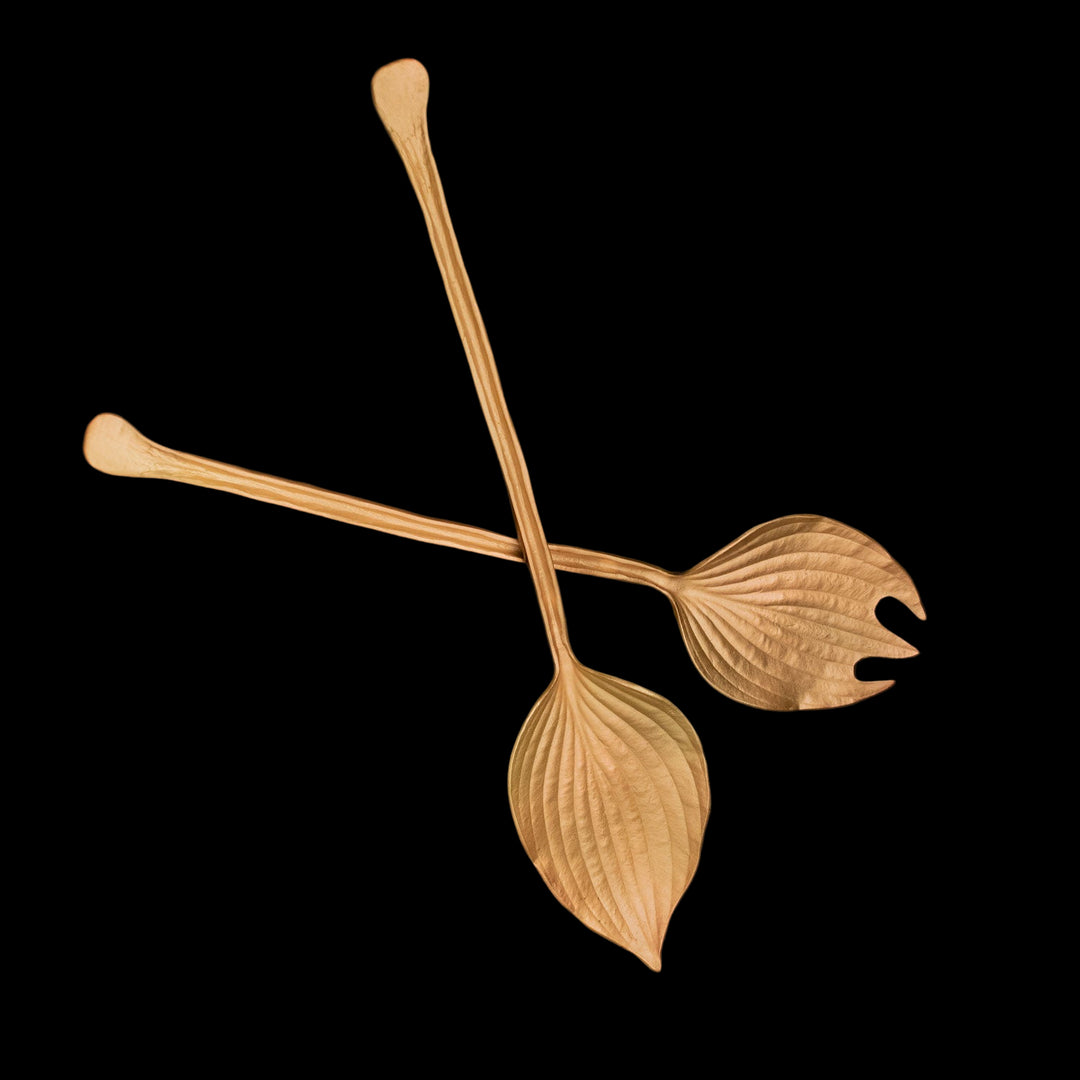 Image of the Michael Michaud Hosta Serving Set on a black background