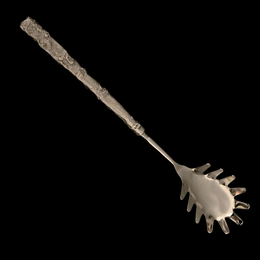 Image of the Michael Michaud Birch Pasta Server on a black background