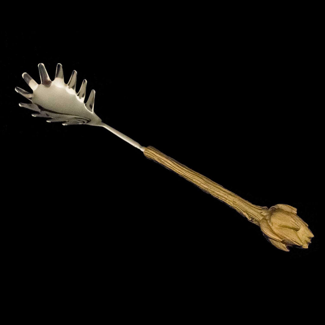 Image of the Michael Michaud Artichoke Pasta Server on a black background