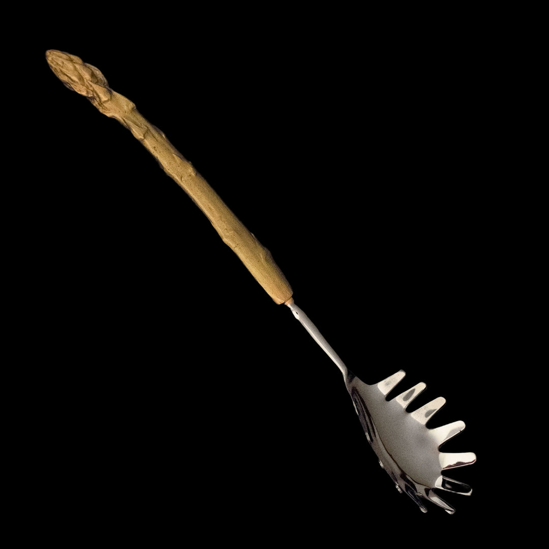 Image of the Michael Michaud Asparagus Pasta Server on a black background