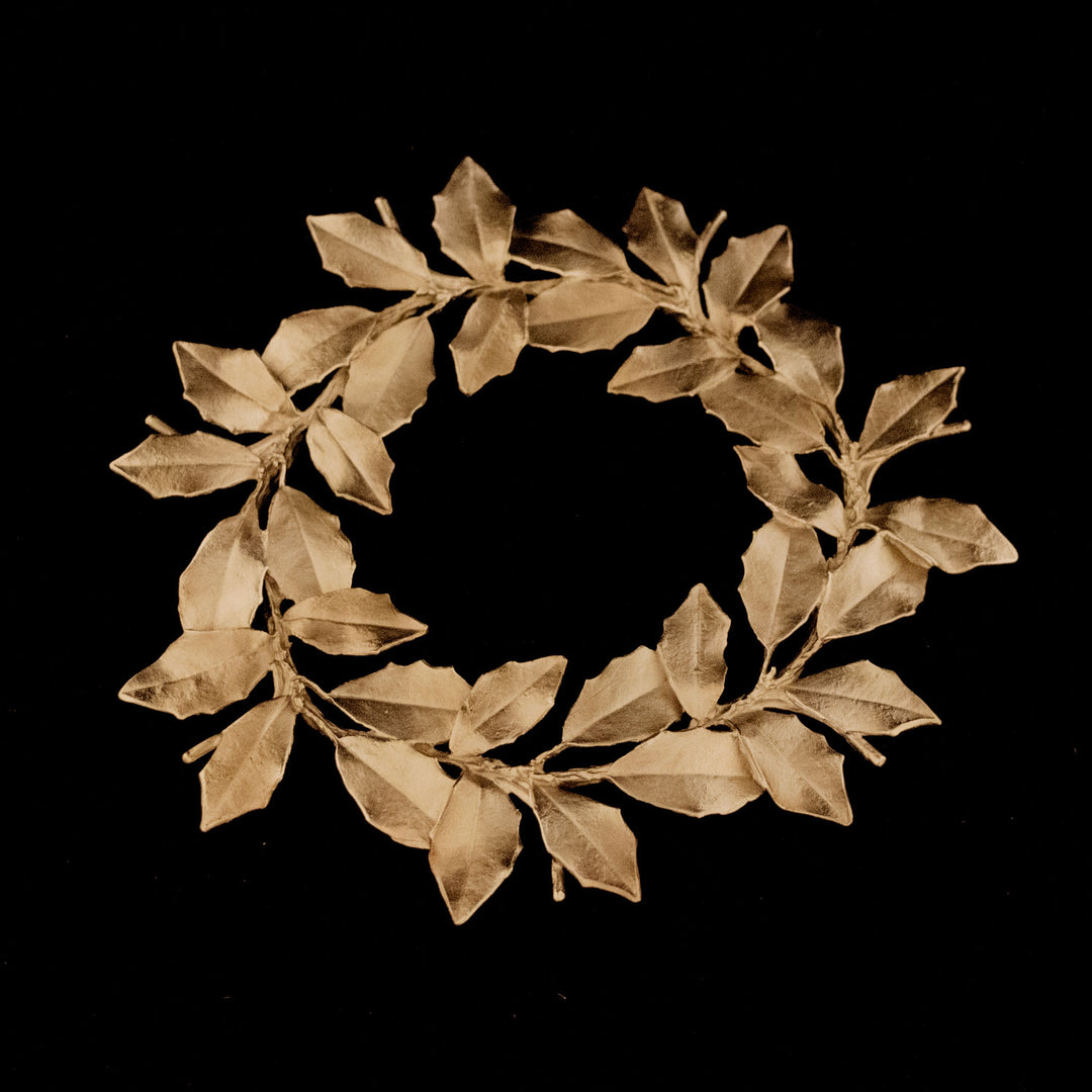 Image of the Michael Michaud Holly Trivet on a black background