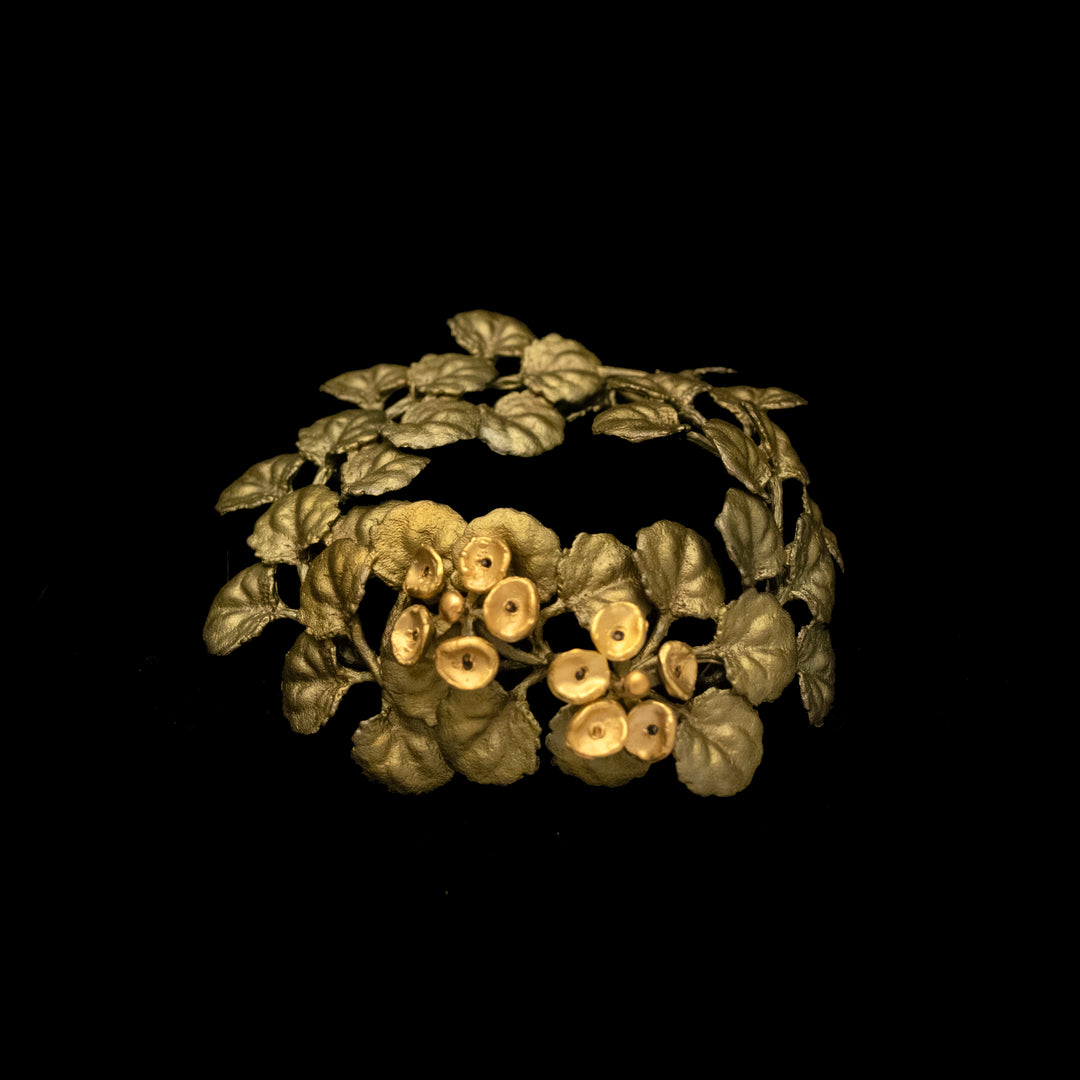 Image of the Michael Michaud Golden African Violet Bracelet - Web Exclusive on a black background