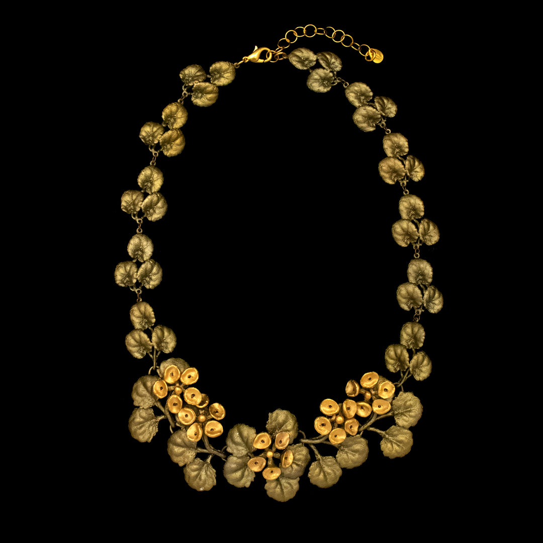 Image of the Michael Michaud Golden African Violet Necklace - Web Exclusive on a black background