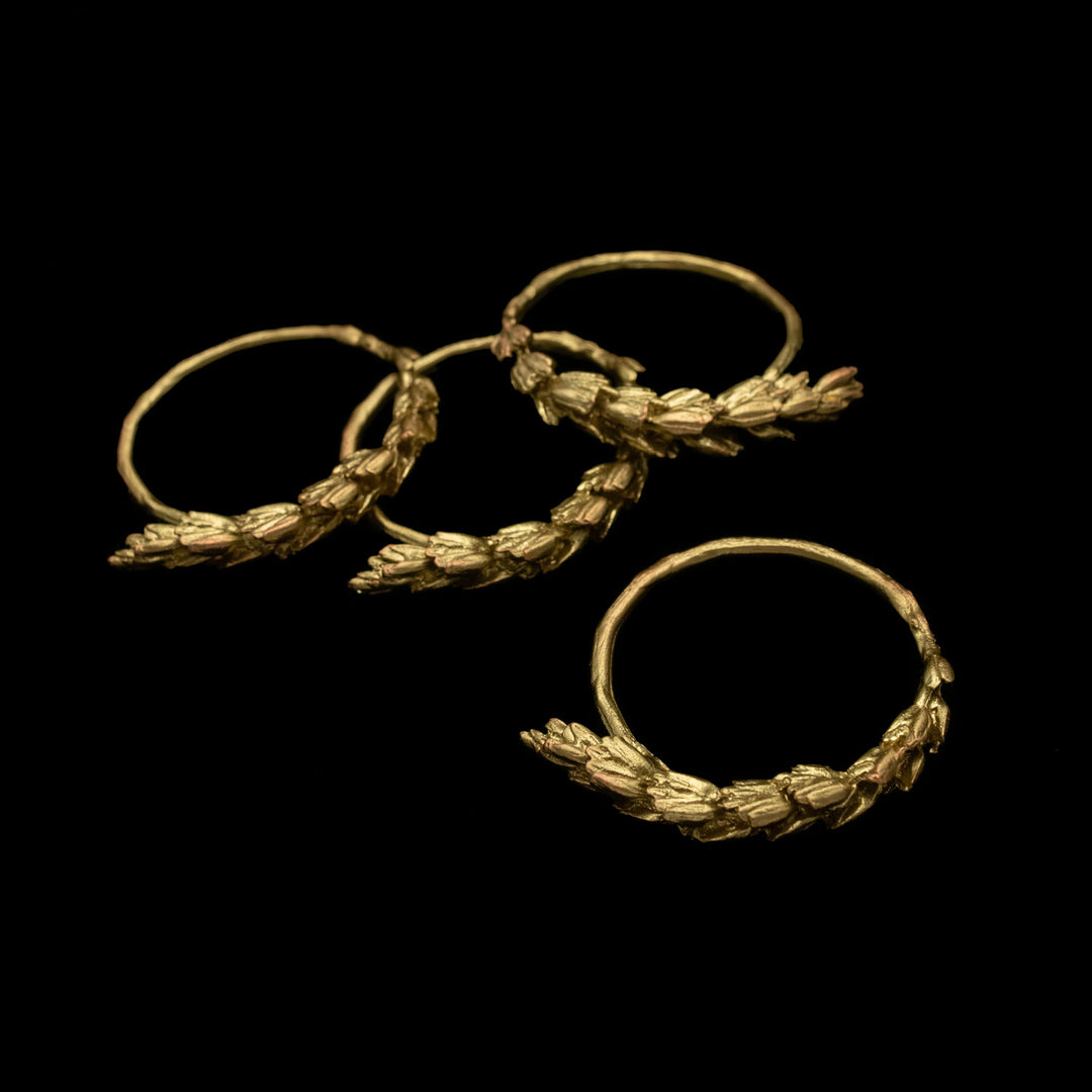 Image of the Michael Michaud Wheat Napkin Rings on a black background