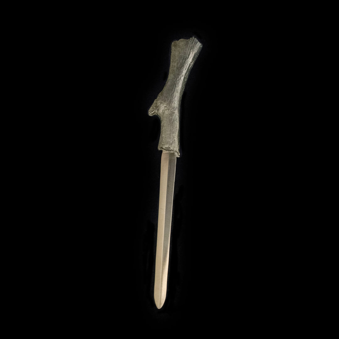 Image of the Michael Michaud Bark Letter Opener on a black background