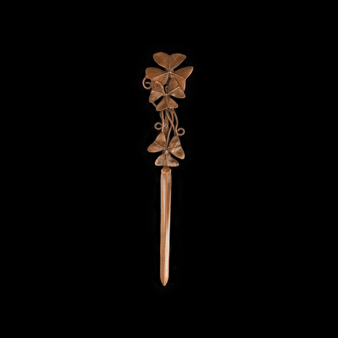 Image of the Michael Michaud Trinity Grass Letter Opener on a black background