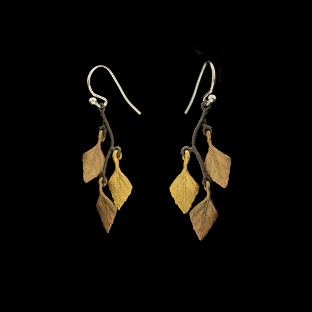 Image of the Michael Michaud Autumn Birch Earrings - Small 3 Leaf Wire on a black background