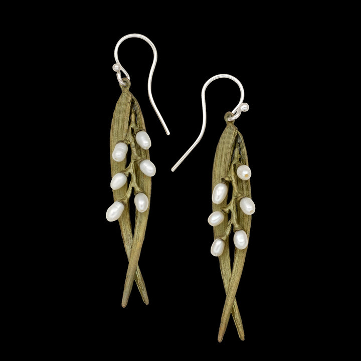 Image of the Michael Michaud Rice Earrings - Double Leaf Pearl Wire on a black background