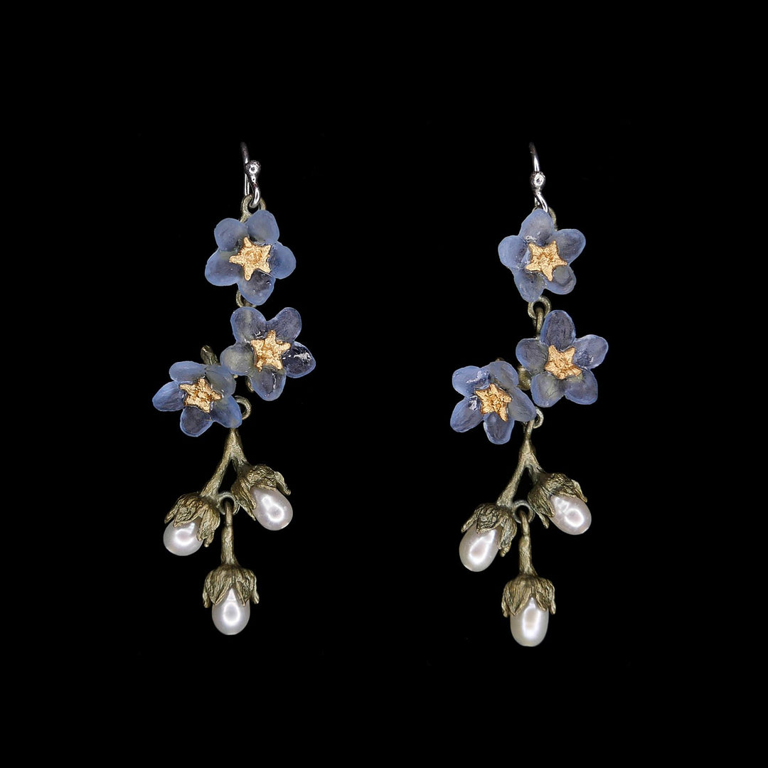 Image of the Michael Michaud Forget Me Not Earrings - Shower Wire on a black background