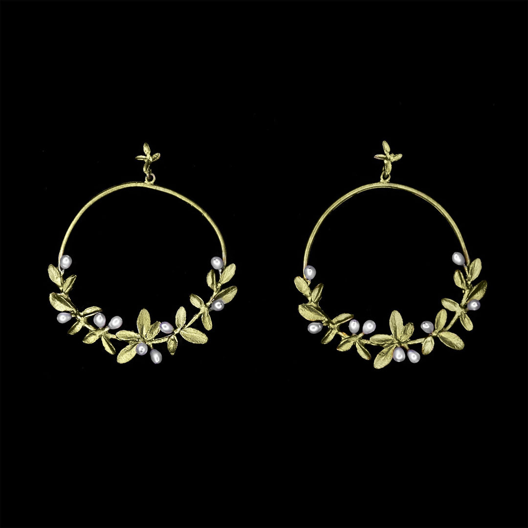 Image of the Michael Michaud Flowering Thyme Earrings - Hoop Post on a black background