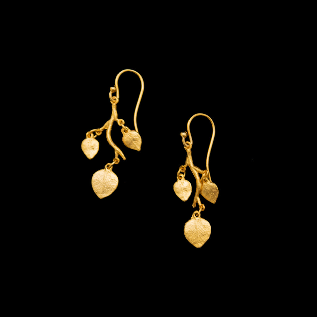 Image of the Michael Michaud Fine Eucalyptus Charm Earrings on a black background