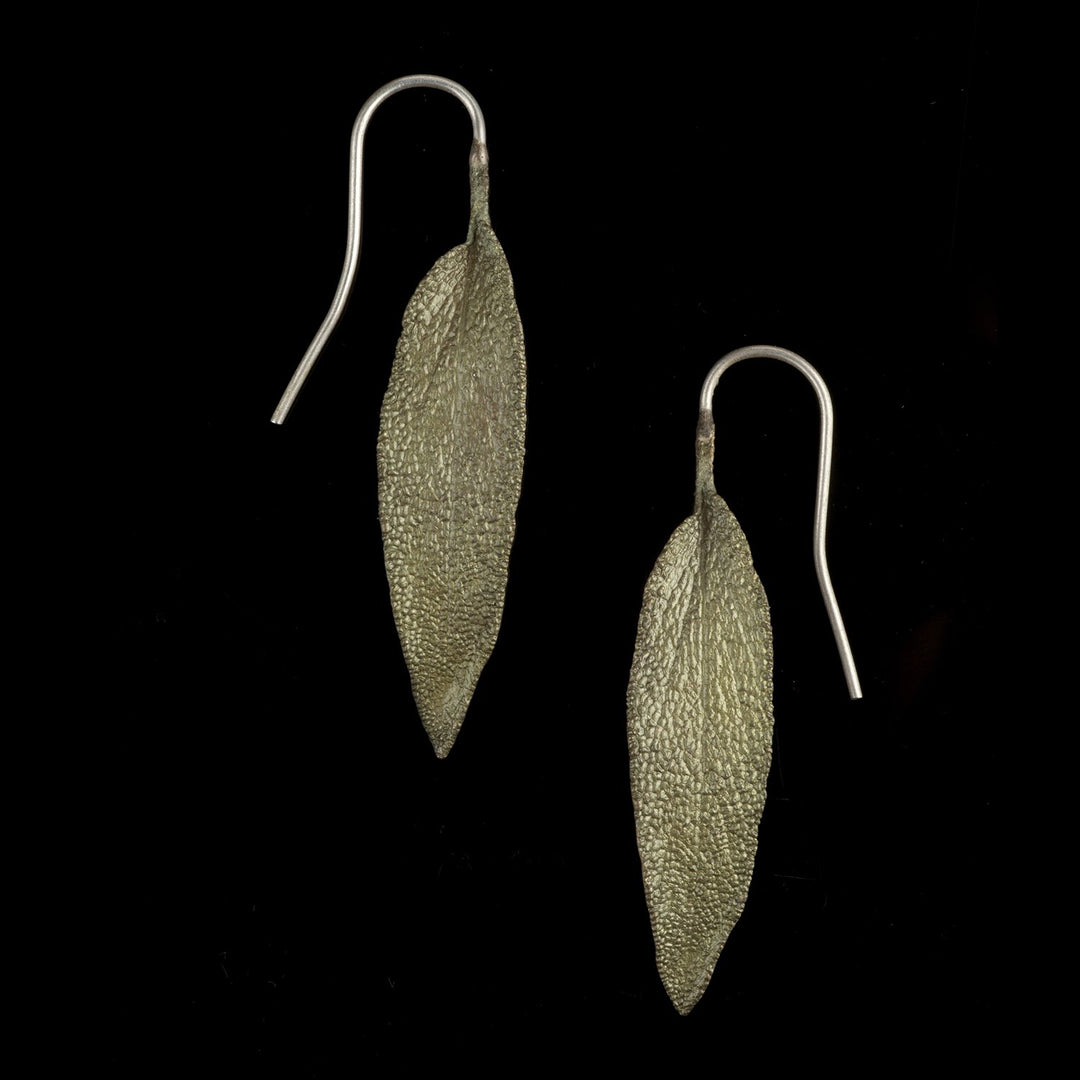 Image of the Michael Michaud Sage Earrings - Leaf on a black background