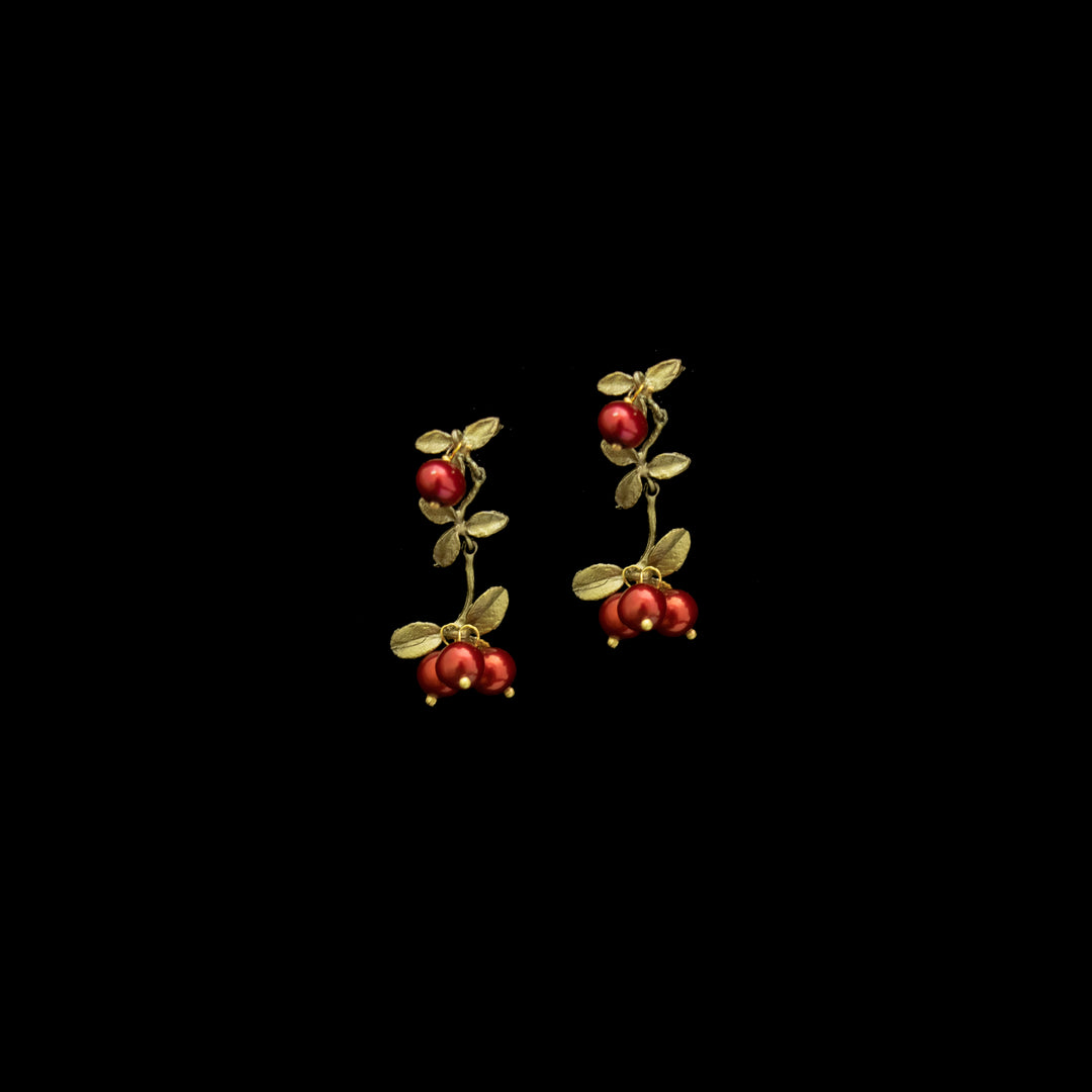 Image of the Michael Michaud Cranberry Dangle Post Earrings on a black background