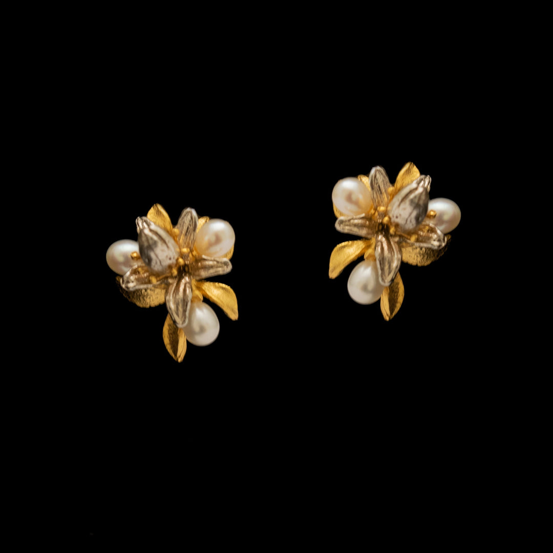 Image of the Michael Michaud Fine Orange Blossom Post Earrings on a black background