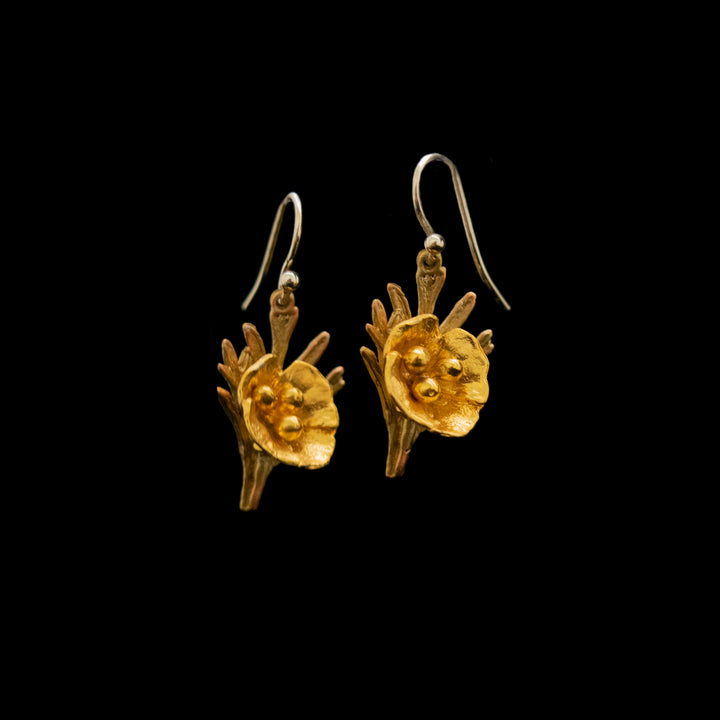 Image of the Michael Michaud Fine California Poppy Earrings - Leaf Wire on a black background