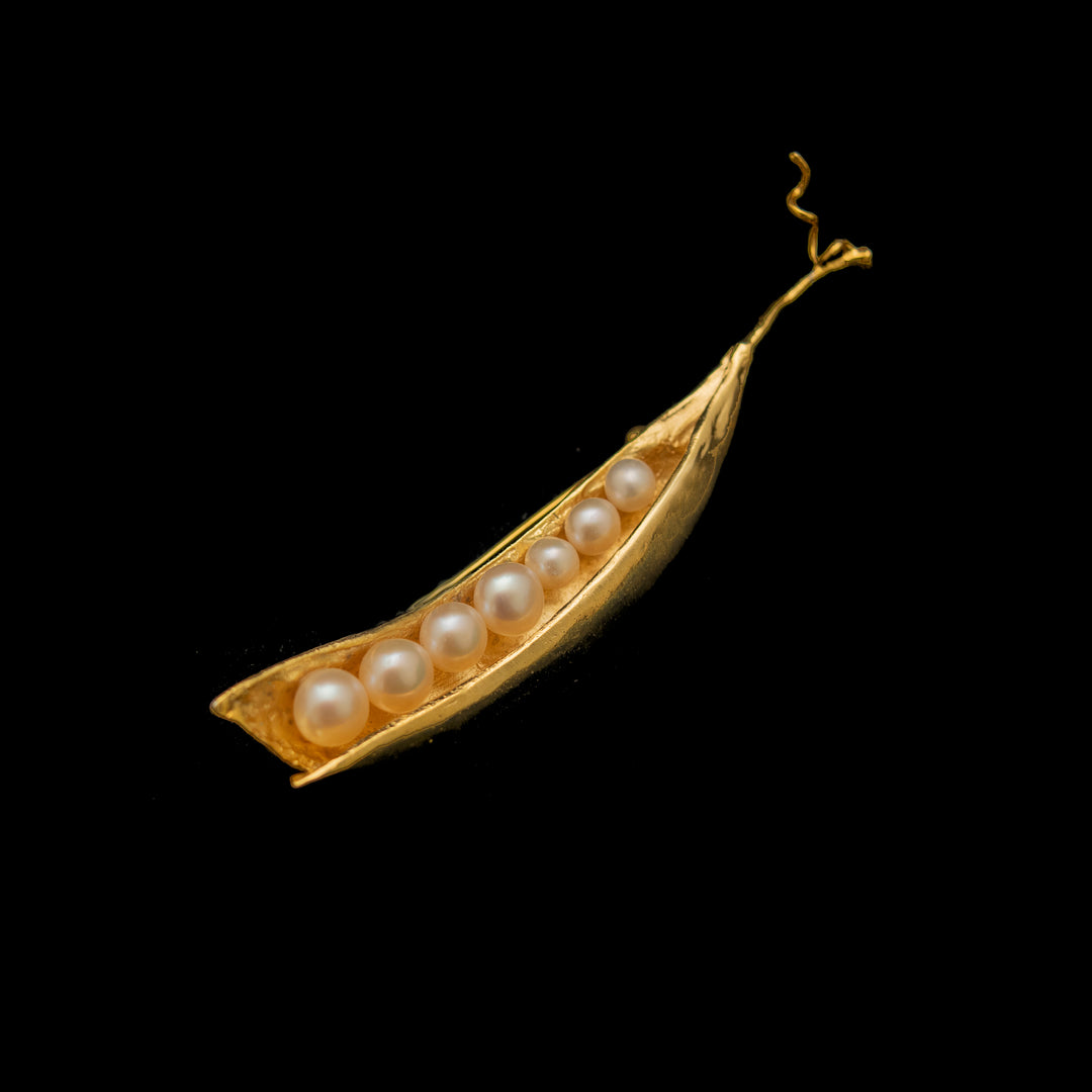 Image of the Michael Michaud Fine Pea Pod 7 Pearls Brooch on a black background