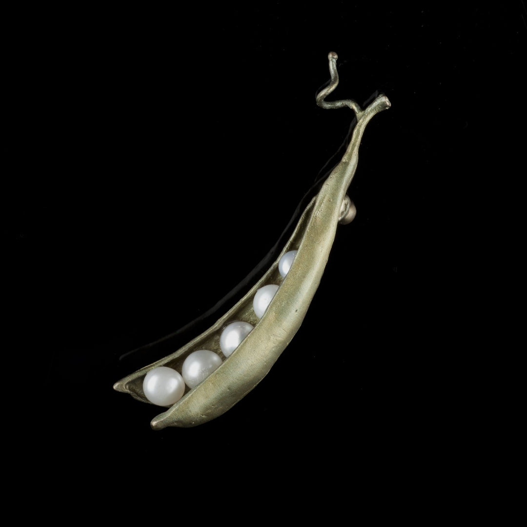 Image of the Michael Michaud Pea Pod Brooch - 5 Pearls on a black background