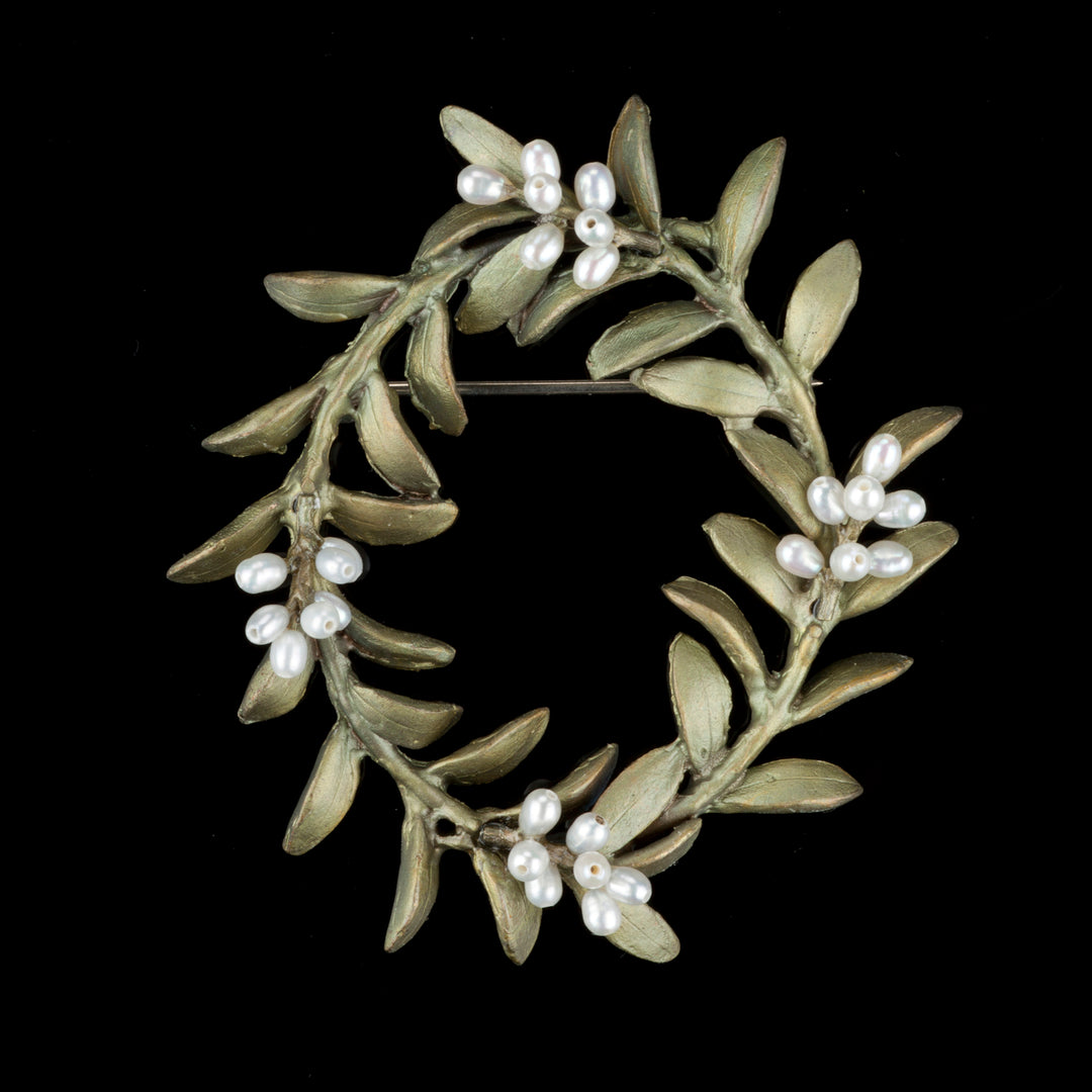 Image of the Michael Michaud Flowering Myrtle Brooch on a black background