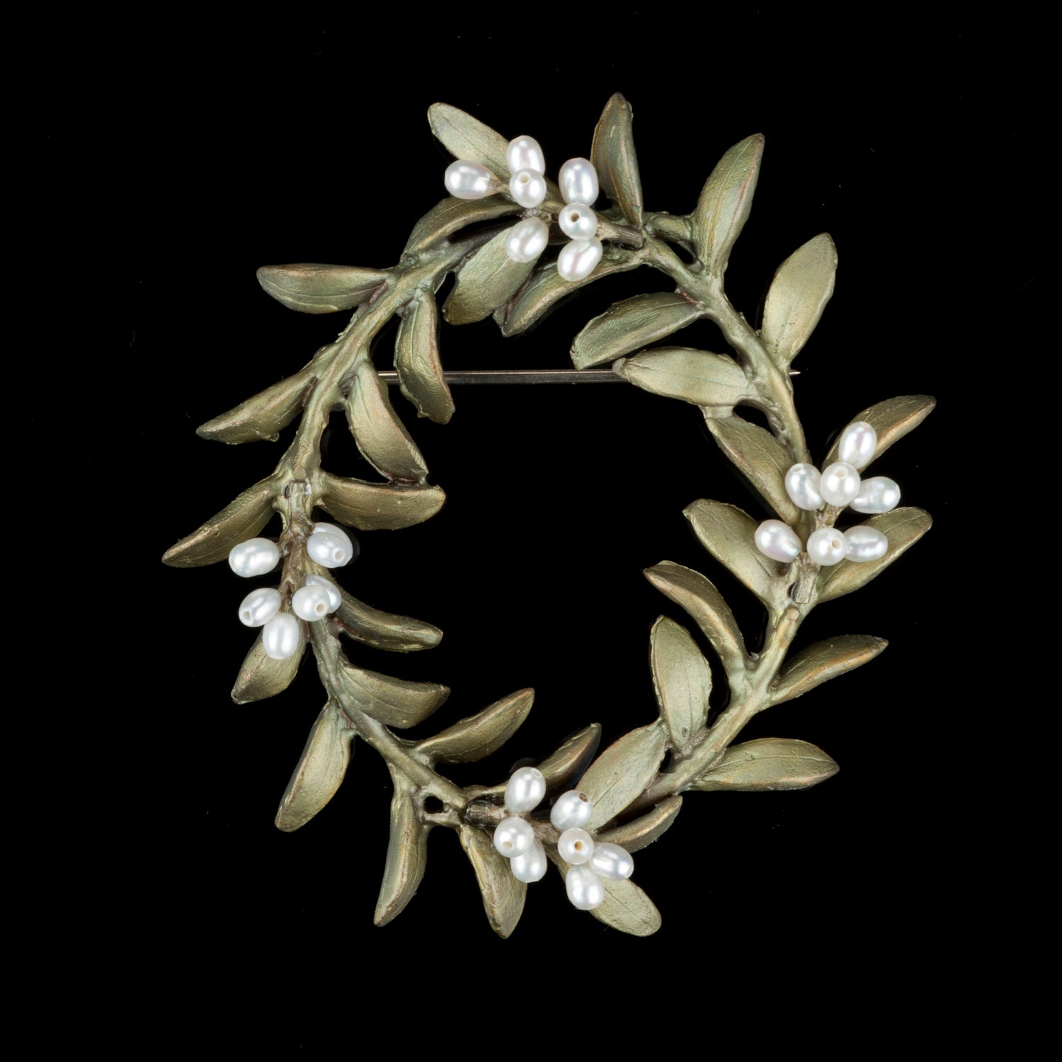Image of the Michael Michaud Flowering Myrtle Brooch on a black background