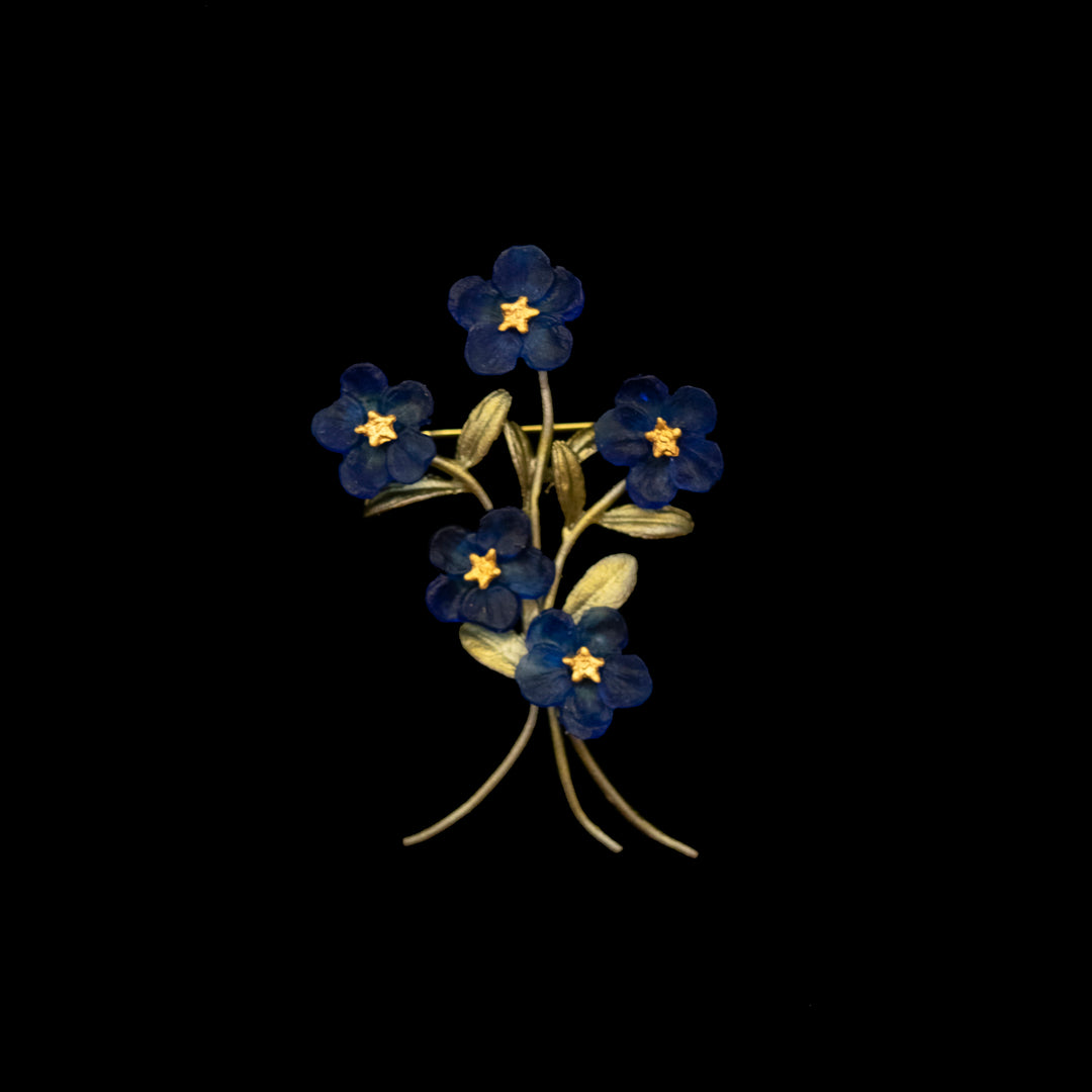 Image of the Michael Michaud Blue Violet Brooch on a black background